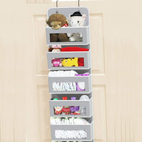 5-pocket hanging organizer on the back of a white bedroom door

