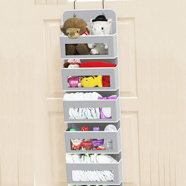 5-pocket hanging organizer on the back of a white bedroom door

