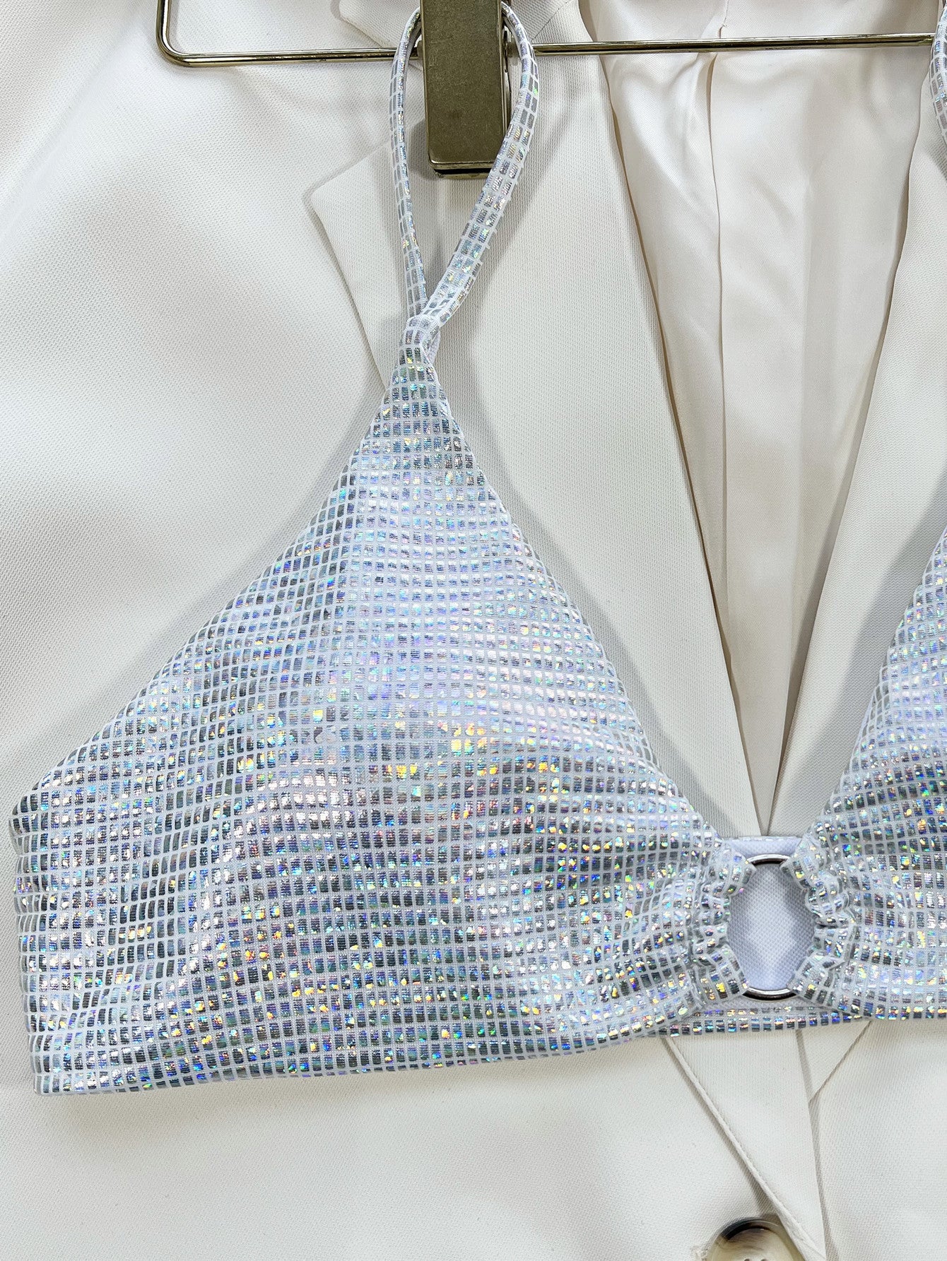  Sunlit Sands bikini featuring a bright and elegant design with a flattering fit. Made from high-quality, stretchy fabric for comfort and style, perfect for beach days, poolside relaxation, and enjoying sunny vacations.