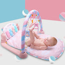 Baby playmat with keyboard, mirror, and hanging toys for newborn sensory development.

