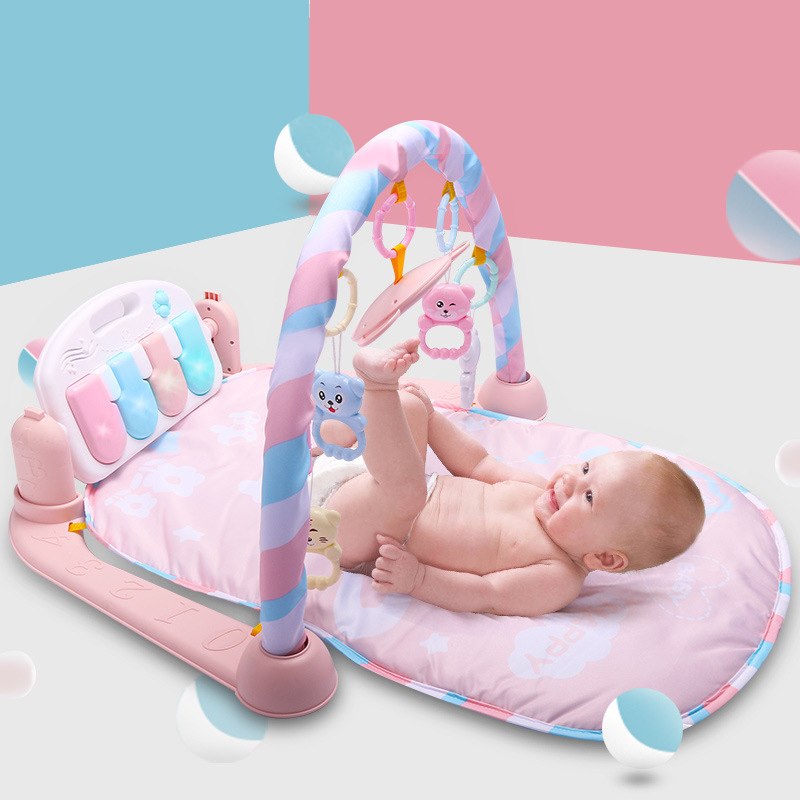 Baby playmat with keyboard, mirror, and hanging toys for newborn sensory development.

