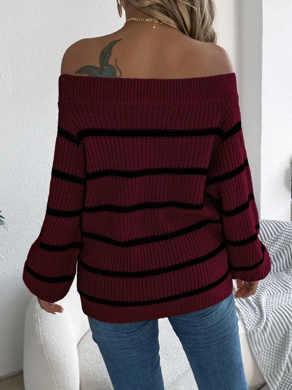 Women's striped off-shoulder sweater with long sleeves, front view

