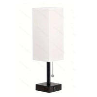 Modern square linen desk lamp with USB charging ports and 3-color dimmable lighting on a minimalist nightstand

