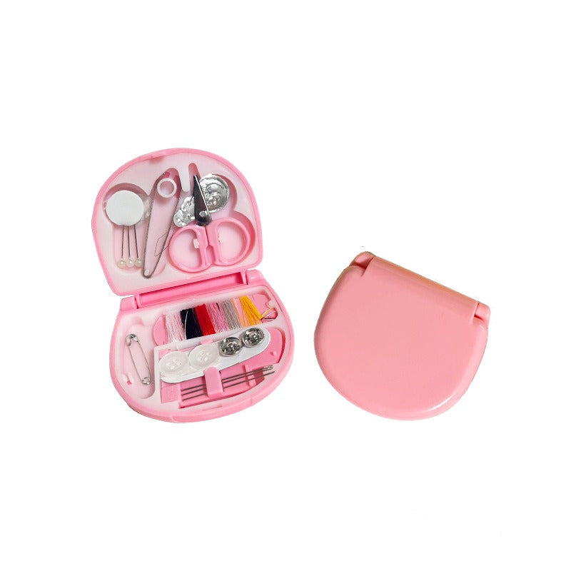 Compact mini needle box designed for organizing sewing needles, featuring multiple compartments for easy access and storage, perfect for home or travel use