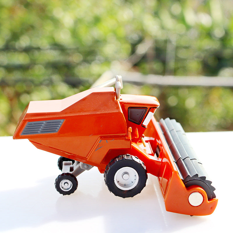Alloy toy set featuring a racing car, harvester, and an Uncle Cow figure, made of durable metal with detailed paintwork and movable parts, designed for children ages 3 and up