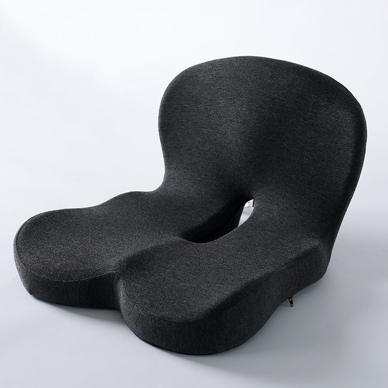 Memory foam ergonomic cushion with integrated back and seat support on an office chair

