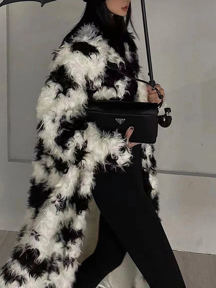 Model wearing the Temperament O-neck lambswool fur coat with contrast color design

