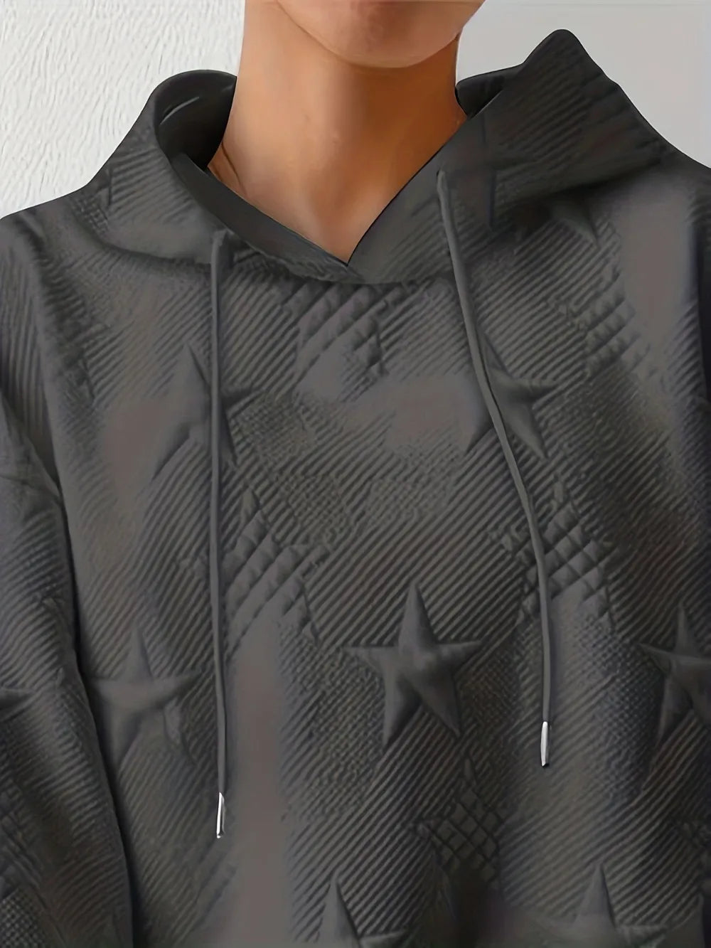 White women’s casual pullover hoodie with star texture and drawstring hood.








