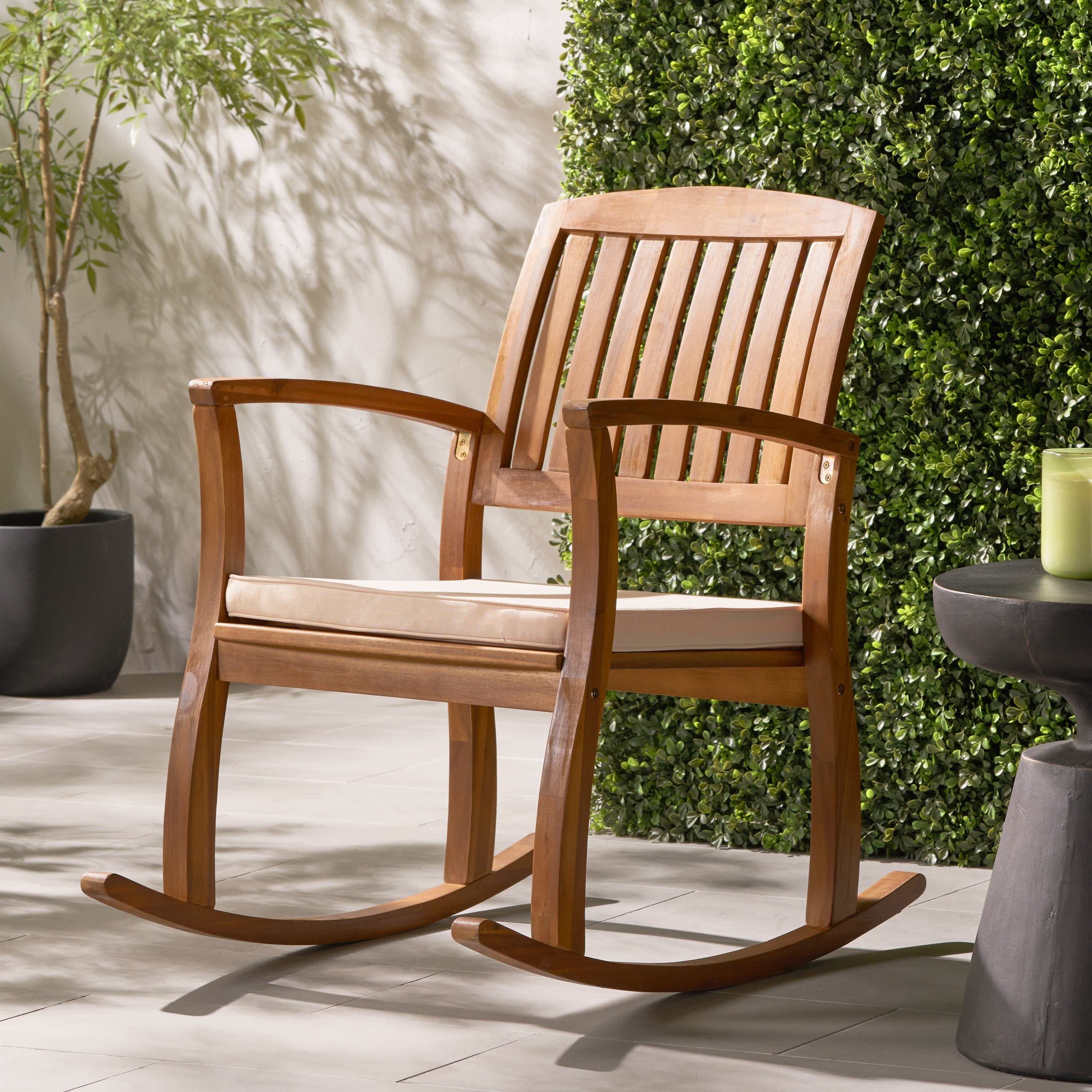 Selma rocking chair with a comfortable cushion, featuring a classic design and smooth rocking motion, perfect for relaxing in living rooms, patios, or nurseries