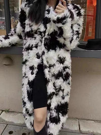 Model wearing the Temperament O-neck lambswool fur coat with contrast color design

