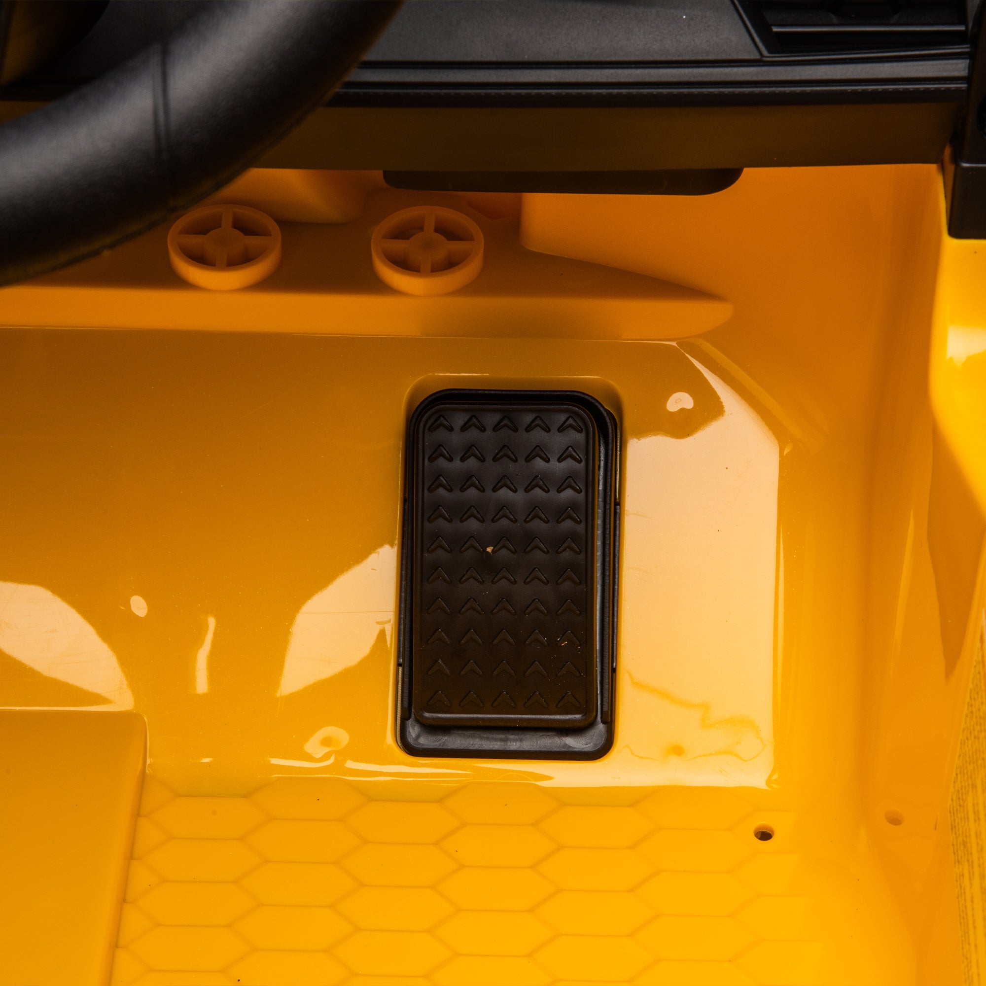 Yellow BMW M4 12V electric ride-on car for kids, featuring authentic design with working headlights, MP3 player, and forward/reverse motion. Comes with adjustable seat and steering wheel, providing a realistic driving experience for children aged 3-6