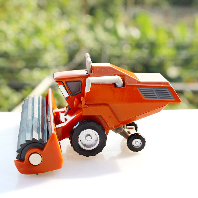 Alloy toy set featuring a racing car, harvester, and an Uncle Cow figure, made of durable metal with detailed paintwork and movable parts, designed for children ages 3 and up
