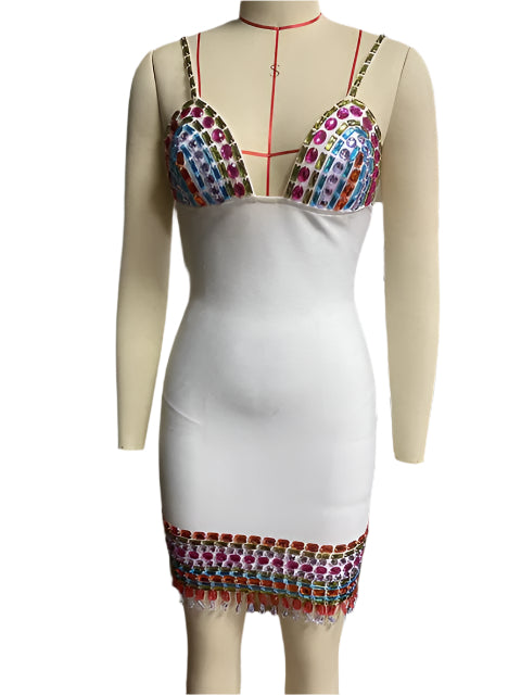 Woman wearing a black sleeveless bodycon dress with colorful crystal embellishments, deep V-neckline, and thin straps—styled for a nightclub or evening party.

