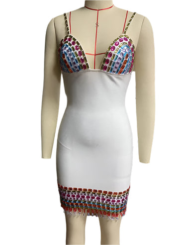 Woman wearing a black sleeveless bodycon dress with colorful crystal embellishments, deep V-neckline, and thin straps—styled for a nightclub or evening party.

