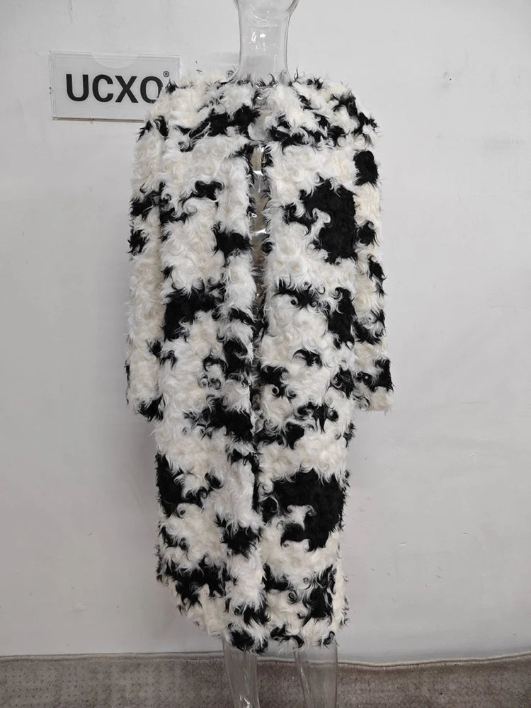 Model wearing the Temperament O-neck lambswool fur coat with contrast color design


