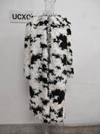 Model wearing the Temperament O-neck lambswool fur coat with contrast color design

