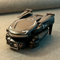 V88 UAV 4K dual camera drone, featuring high-definition 4K video recording, front and bottom cameras for versatile shots, and advanced flight stability. Equipped with intelligent flight modes and a long-lasting battery, perfect for aerial photography and outdoor adventures