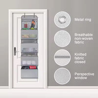5-pocket hanging organizer on the back of a white bedroom door

