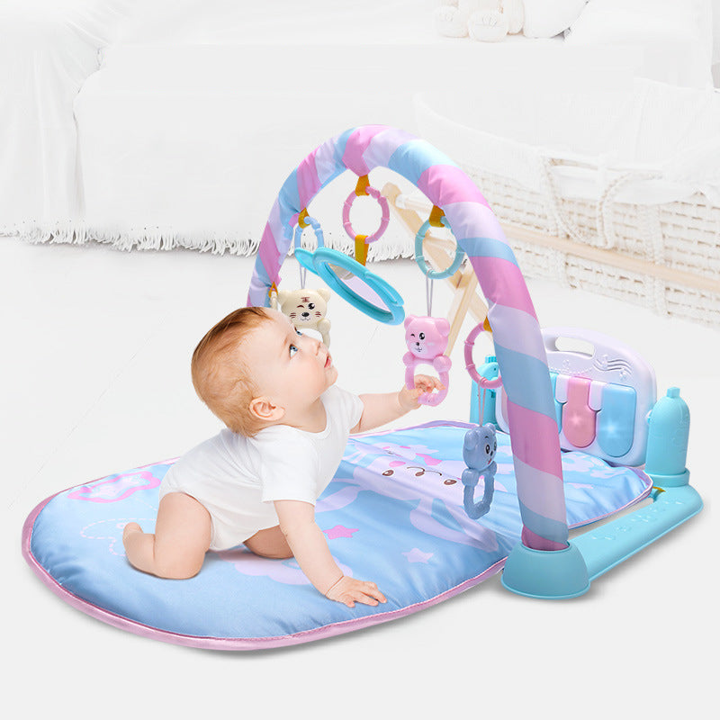 Baby playmat with keyboard, mirror, and hanging toys for newborn sensory development.

