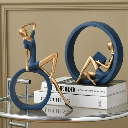 OK Reading Girl resin desktop decoration, depicting a girl engrossed in a book, crafted with fine details to add a whimsical and artistic touch to any workspace or home decor.