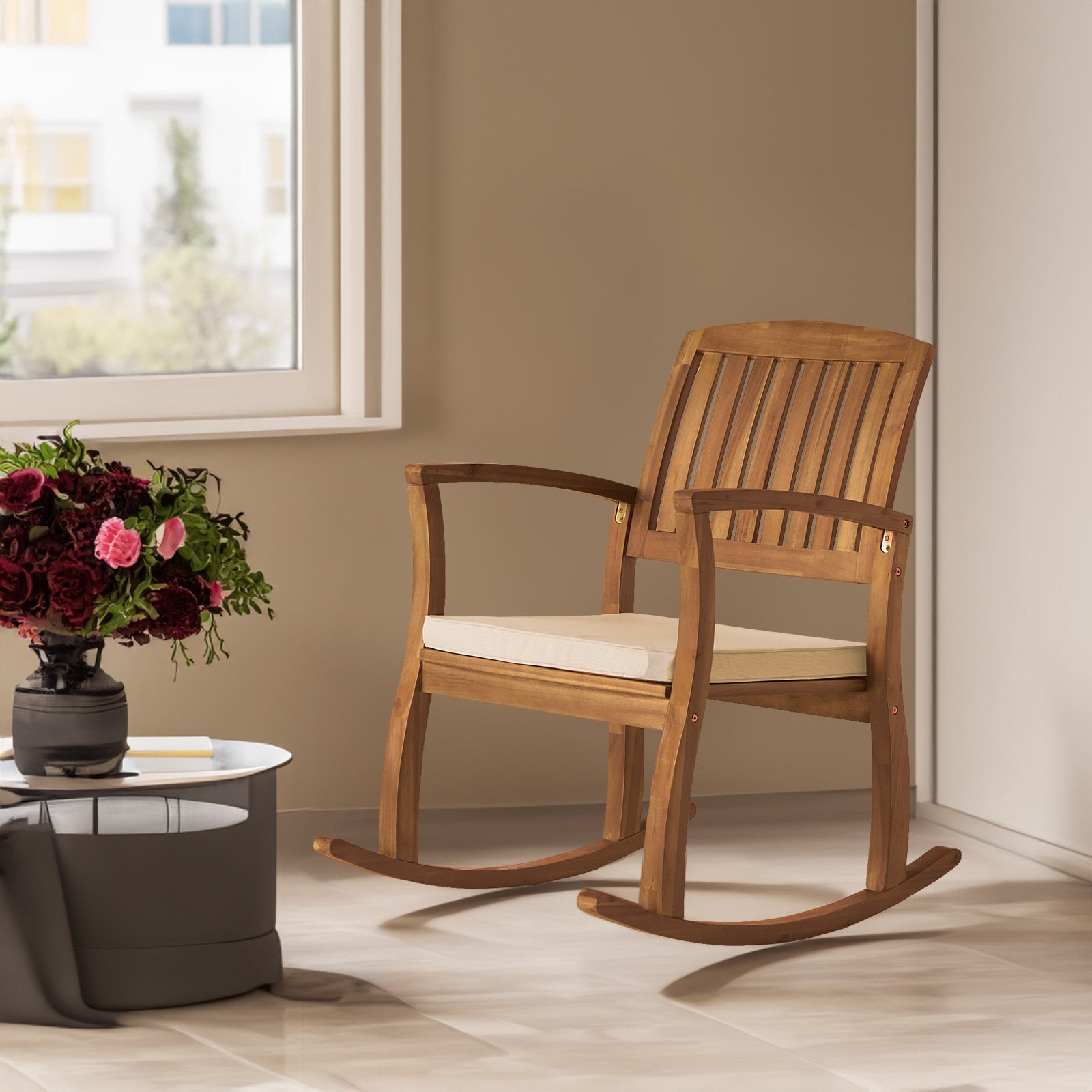 Selma rocking chair with a comfortable cushion, featuring a classic design and smooth rocking motion, perfect for relaxing in living rooms, patios, or nurseries