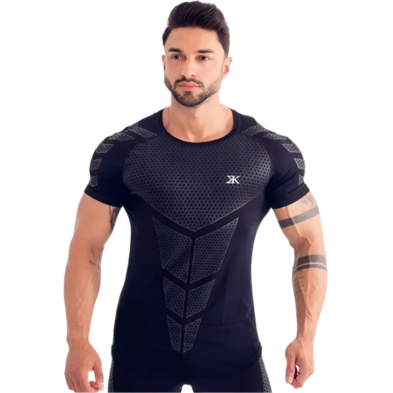 Man wearing a tight-fit short sleeve compression T-shirt in quick-dry fabric for running and sports training.

