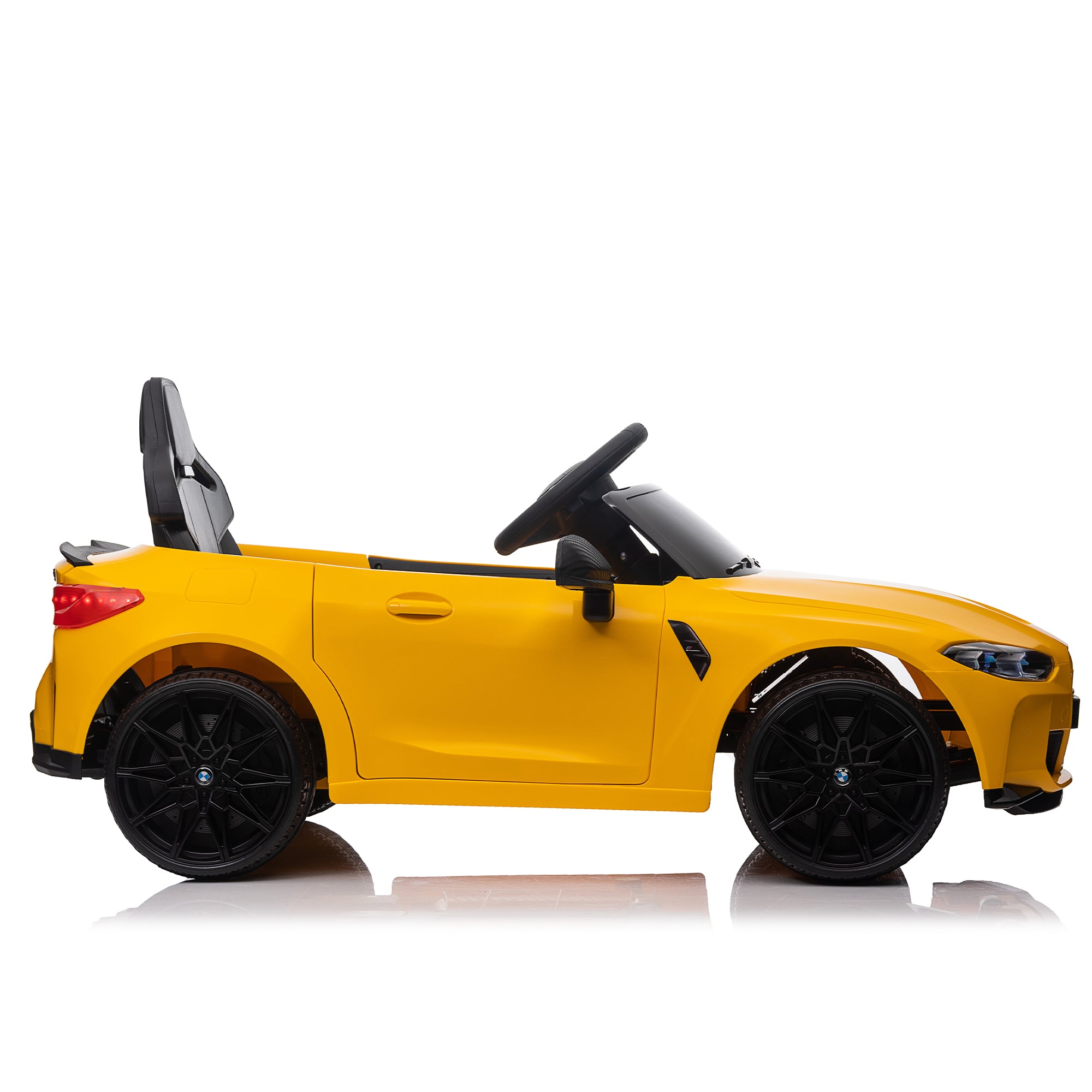 Yellow BMW M4 12V electric ride-on car for kids, featuring authentic design with working headlights, MP3 player, and forward/reverse motion. Comes with adjustable seat and steering wheel, providing a realistic driving experience for children aged 3-6