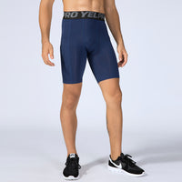 Men’s black PRO gym shorts with built-in compression tights, side pockets, and sweat-wicking fabric

