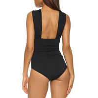 Tequila Shots cross halter swimsuit featuring a trendy and bold design with a flattering cross-back halter top. Made from high-quality, stretchy fabric for comfort and style, perfect for beach days, pool parties, and sunny vacations.