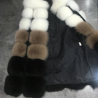 Woman wearing a colorful patchwork faux fur vest in winter setting