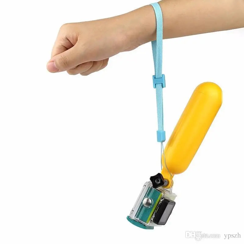 Floating hand grip for GoPro Hero action cameras in yellow color