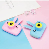 Cute kids' digital cartoon camera with HD lens and 2-inch display for photo and video.

