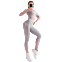 "Women’s seamless yoga set consisting of a high-waisted, form-fitting pair of leggings paired with a matching sports bra. The set features a smooth, stretchy, and breathable fabric, designed in a minimalist style for maximum comfort and flexibility during yoga or fitness activities."
