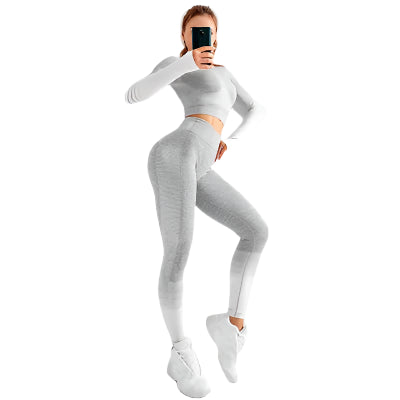 "Women’s seamless yoga set consisting of a high-waisted, form-fitting pair of leggings paired with a matching sports bra. The set features a smooth, stretchy, and breathable fabric, designed in a minimalist style for maximum comfort and flexibility during yoga or fitness activities."