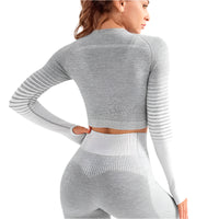 "Women’s seamless yoga set consisting of a high-waisted, form-fitting pair of leggings paired with a matching sports bra. The set features a smooth, stretchy, and breathable fabric, designed in a minimalist style for maximum comfort and flexibility during yoga or fitness activities."
