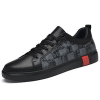 Men's flat cowhide leather casual shoes with a sleek design, ideal for casual and semi-casual occasions.








