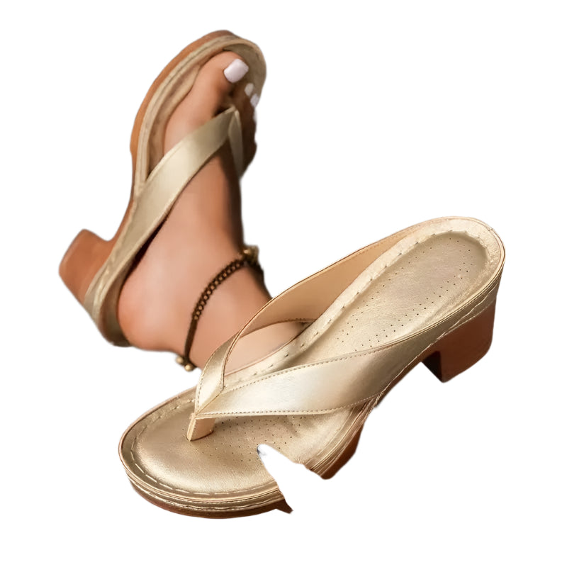 Women's solid color fashion wedge flip-flops with cushioned sole.

