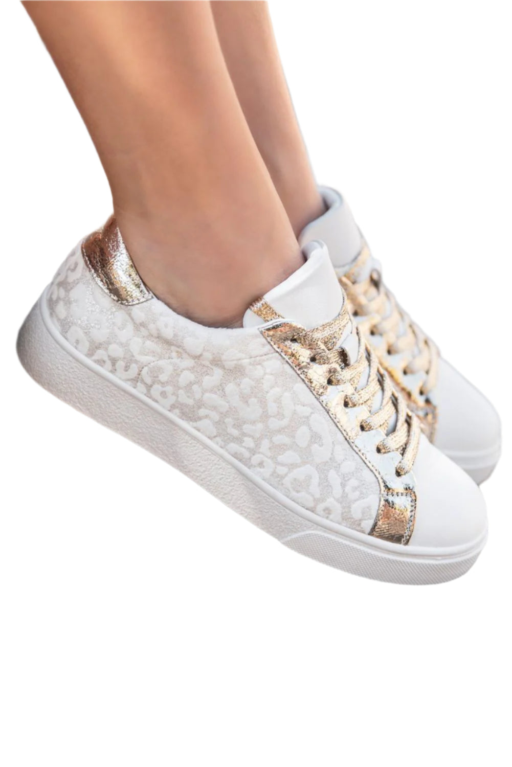 Women's white sneakers with vintage leopard print accents, stylish and comfortable.

