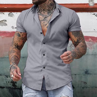 Men’s casual solid color shirt with short sleeves, perfect for summer, offering a relaxed fit and breathable material.








