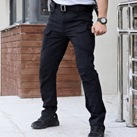 Men’s loose-fit camouflage cargo pants with quick-drying, stretchable fabric and multiple pockets for outdoor and casual use.