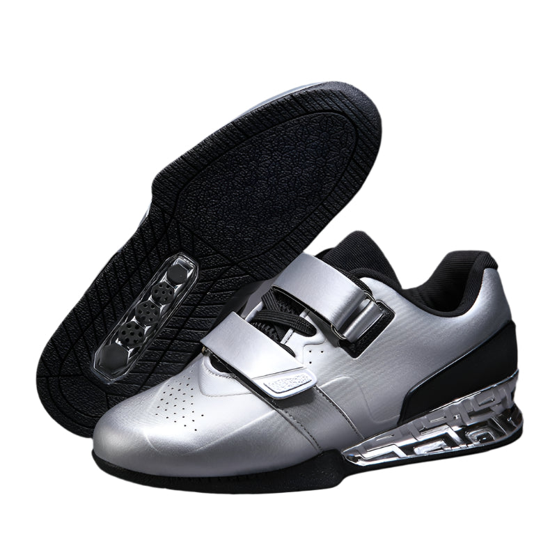 Professional weightlifting squat shoes with hard sole and elevated heel for strength training.

