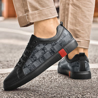 Men's flat cowhide leather casual shoes with a sleek design, ideal for casual and semi-casual occasions.








