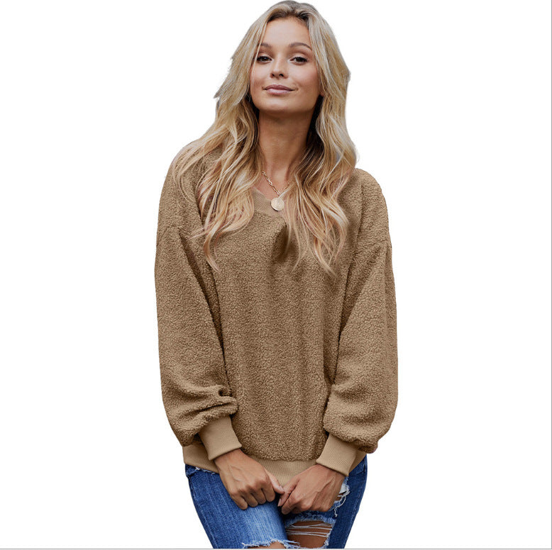 Women's solid color pullover, long-sleeve round-neck loose casual top for autumn and winter.








