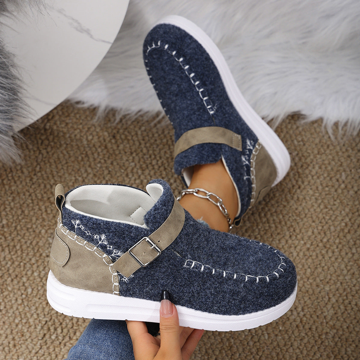 Warm flat bottom cotton shoes with burr closure for comfort and insulation during colder weather.








