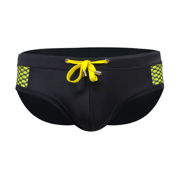 Men’s close-fitting swim briefs with polka dot stitching, designed for beach and sports activities.

