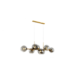 Modern Nordic minimalist glass chandelier lighting in living room setting

