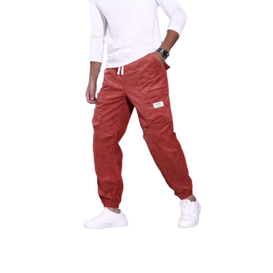 Men's corduroy overalls with ankle-tied loose fit and multi-pocket design for casual wear.