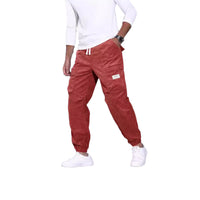 Men's corduroy overalls with ankle-tied loose fit and multi-pocket design for casual wear.