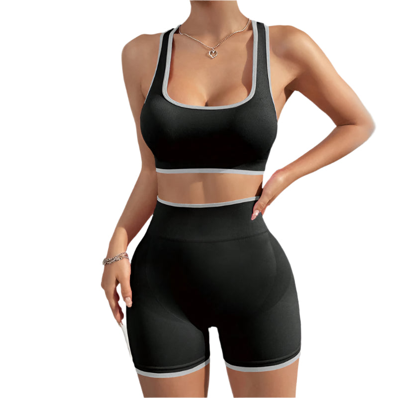 Women's seamless sports yoga set with vest and high-waist shaping shorts, perfect for activewear and workouts.








