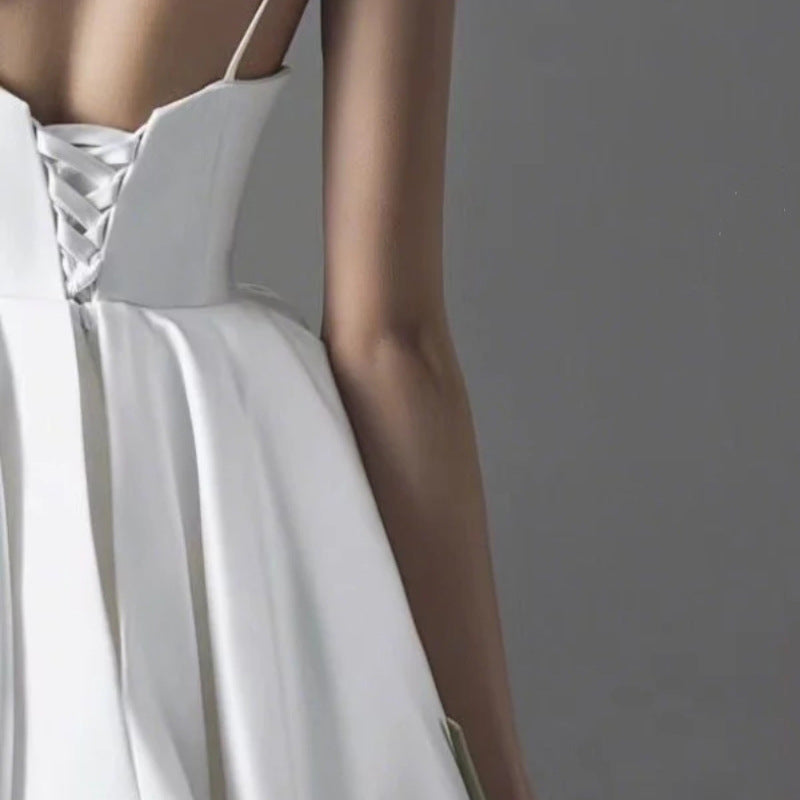 Elegant plus-size wedding dress with lace detailing and a flattering silhouette for modern brides.

